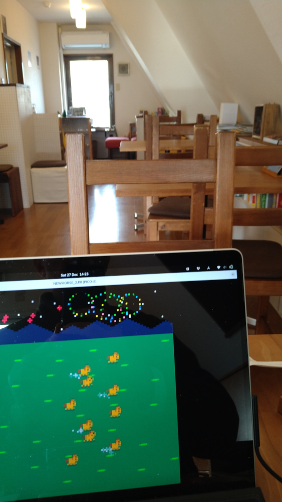 A picture from inside the cafe. There is no one else there and I'm working on pico-8
