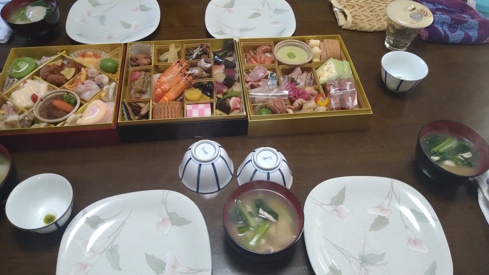 A picture of a traditional osechi meal, laid on a table